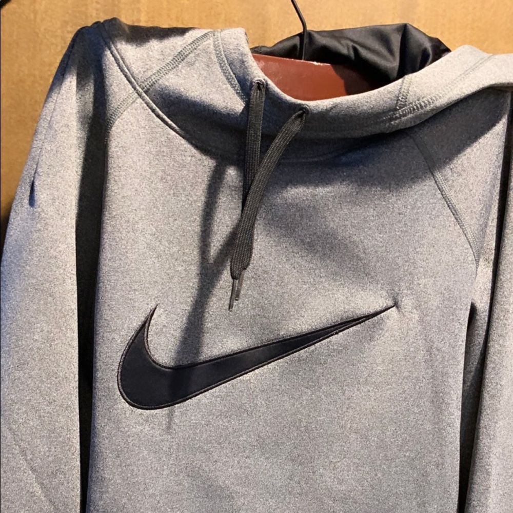 Cowl like Nike sweatshirt. Very cute on and comfortable